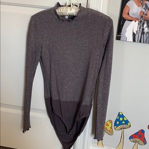 Sparkly gray body suit